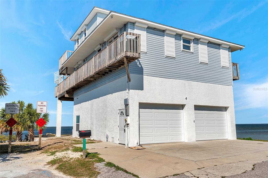 2417 Sunset Vista Drive Spring Hill, FL 34607 - Photo 57 of 61 a front view of a house with a garage