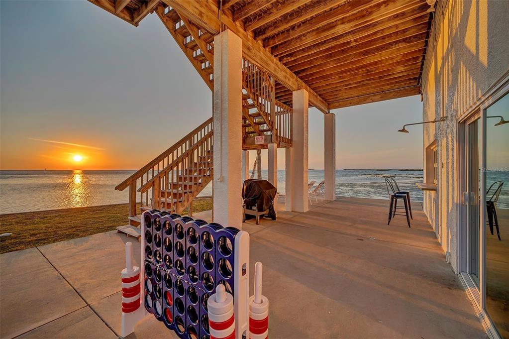 2417 Sunset Vista Drive Spring Hill, FL 34607 - Photo 60 of 61 a balcony view with two chairs and a potted plant