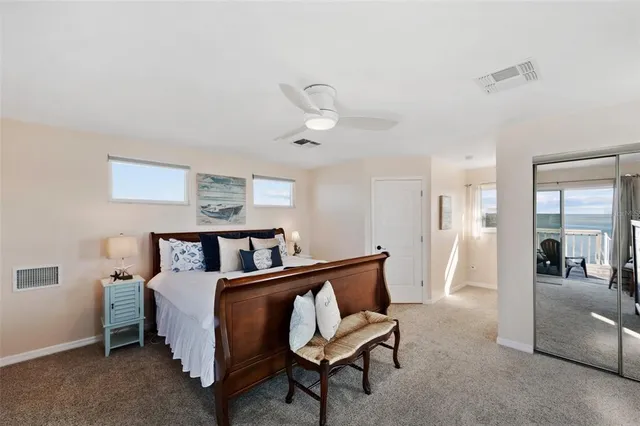 a bed room with furniture and a window