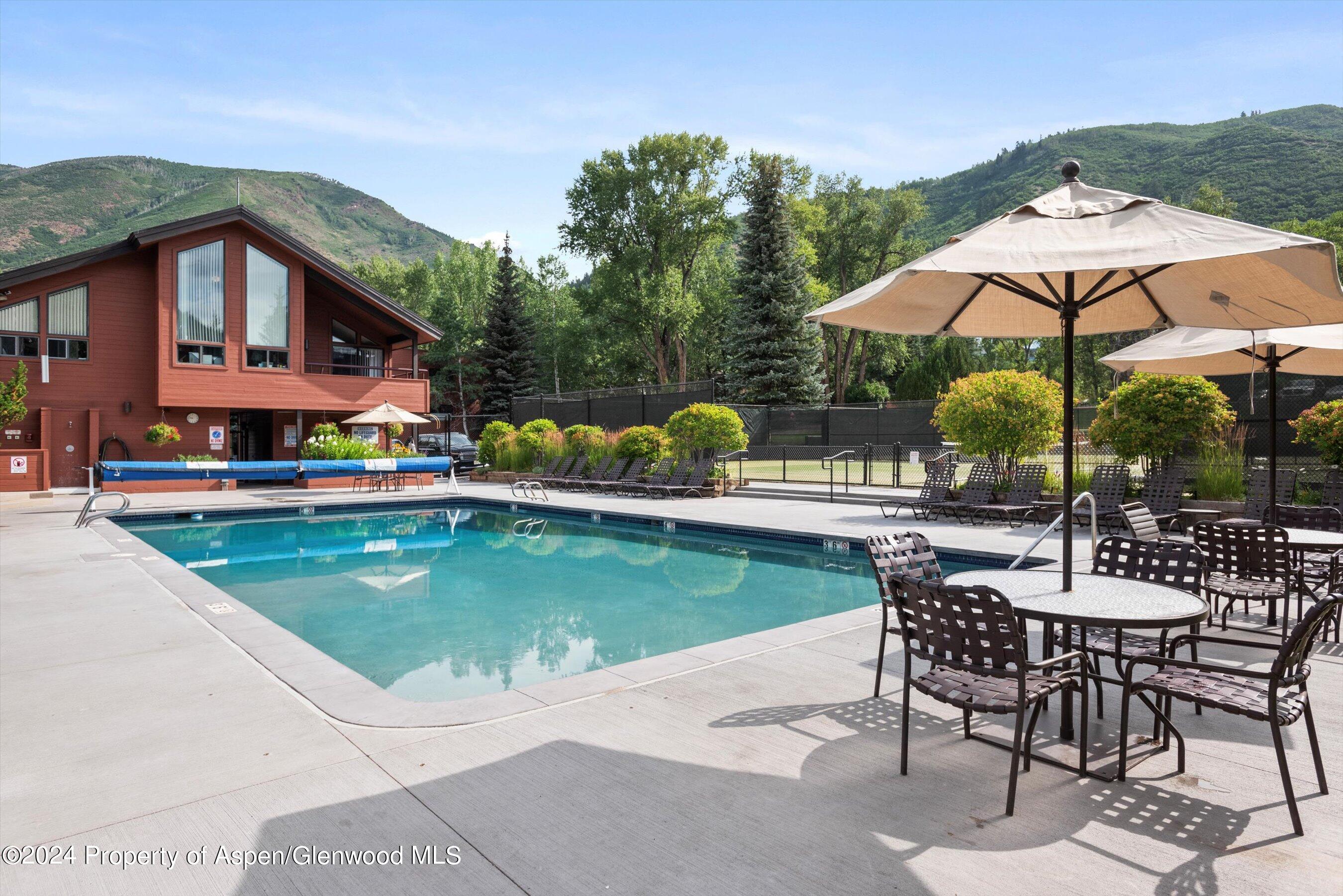 1326 Vine Street, Unit 1326 Aspen, CO 81611 - Photo 13 of 16 a view of pool with outdoor seating