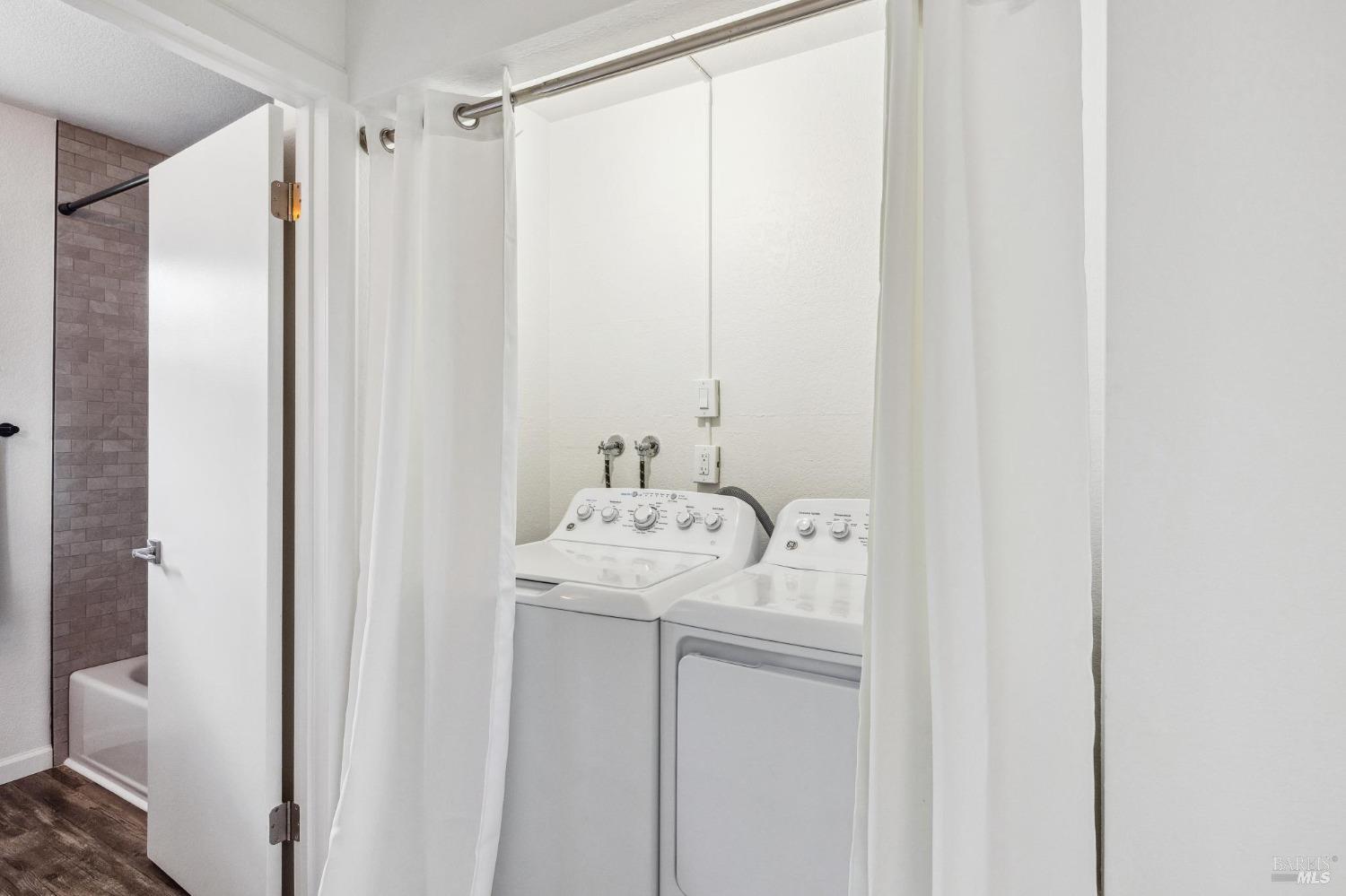 1426 Gold Way Rohnert Park, CA 94928 - Photo 26 of 42 a bathroom with a sink and mirror