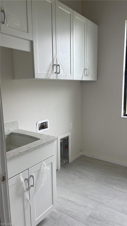 14557 Kingfisher Loop Naples, FL 34120 - Photo 17 of 27 a view white cabinets