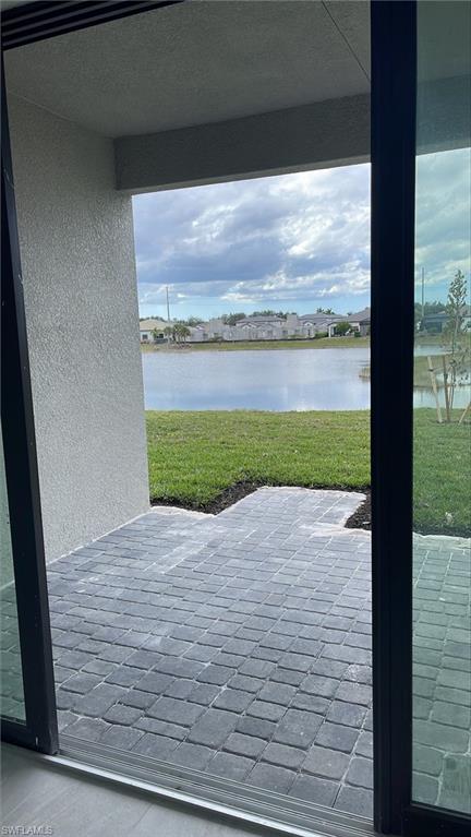 14557 Kingfisher Loop Naples, FL 34120 - Photo 8 of 27 a view of a lake from a window
