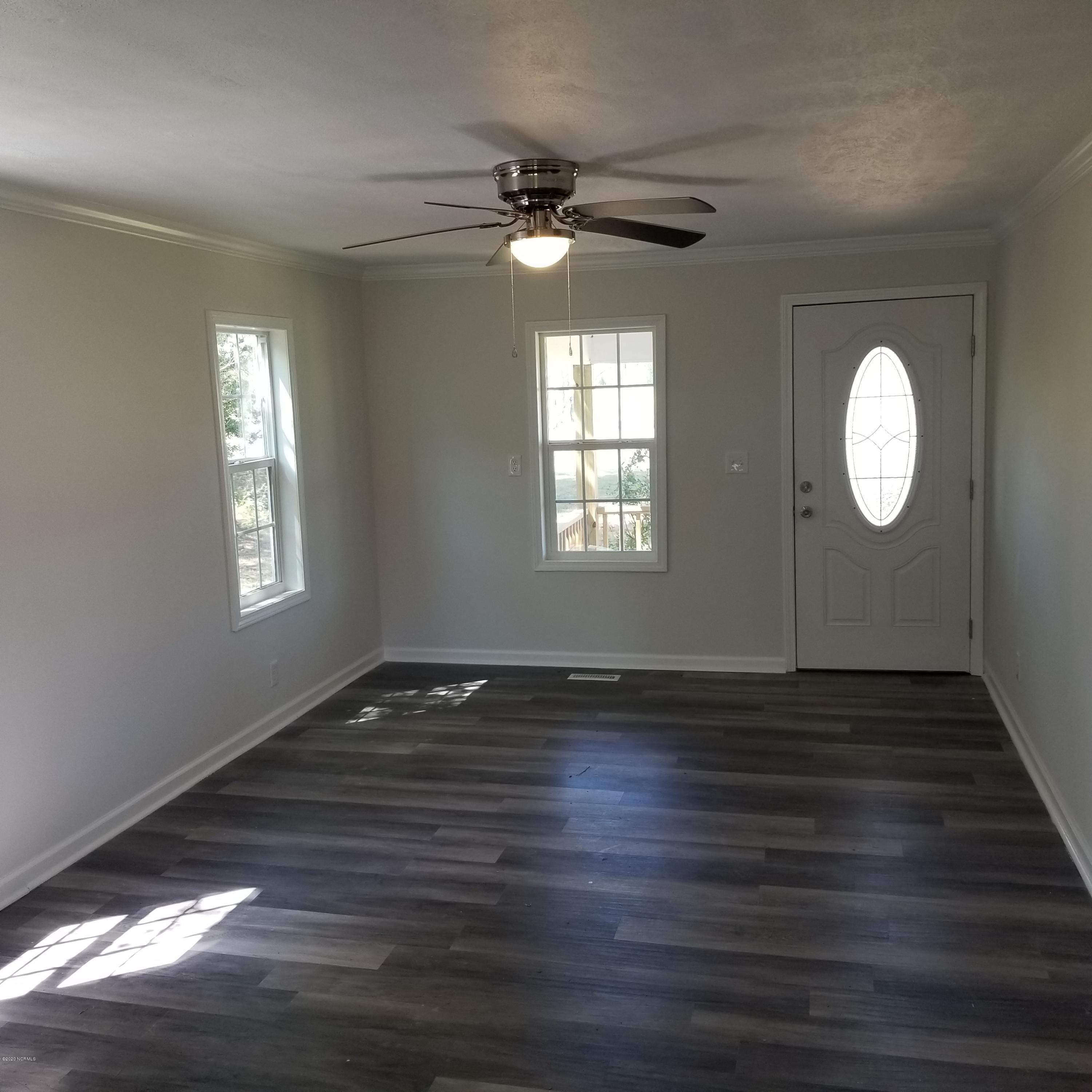 2403 Center Road Bladenboro, NC 28320 - Photo 6 of 16 living room w new vinyl flooring!