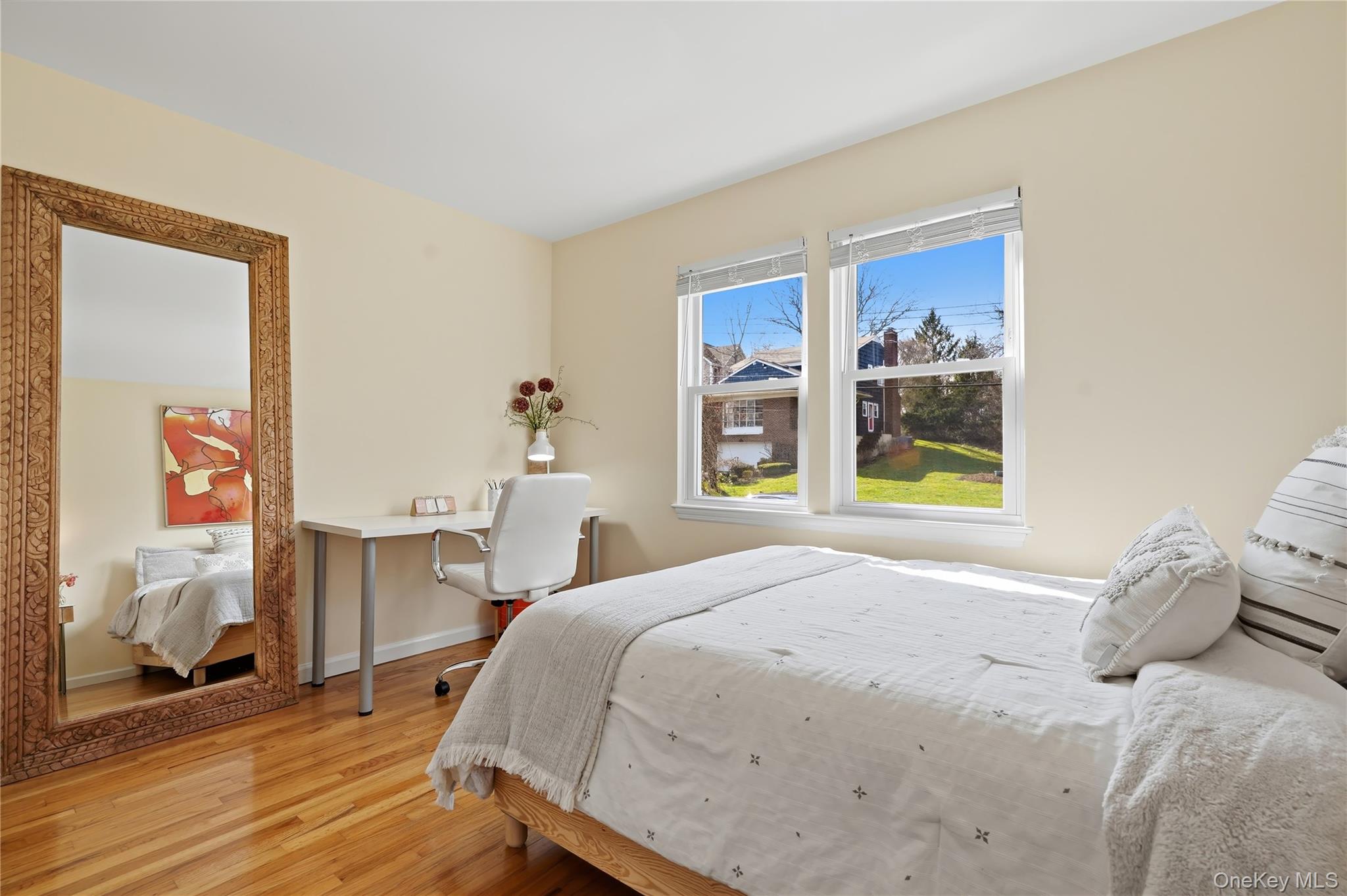 166 Highview Street Mamaroneck, NY 10543 - Photo 15 of 30 a bedroom with a bed and a window