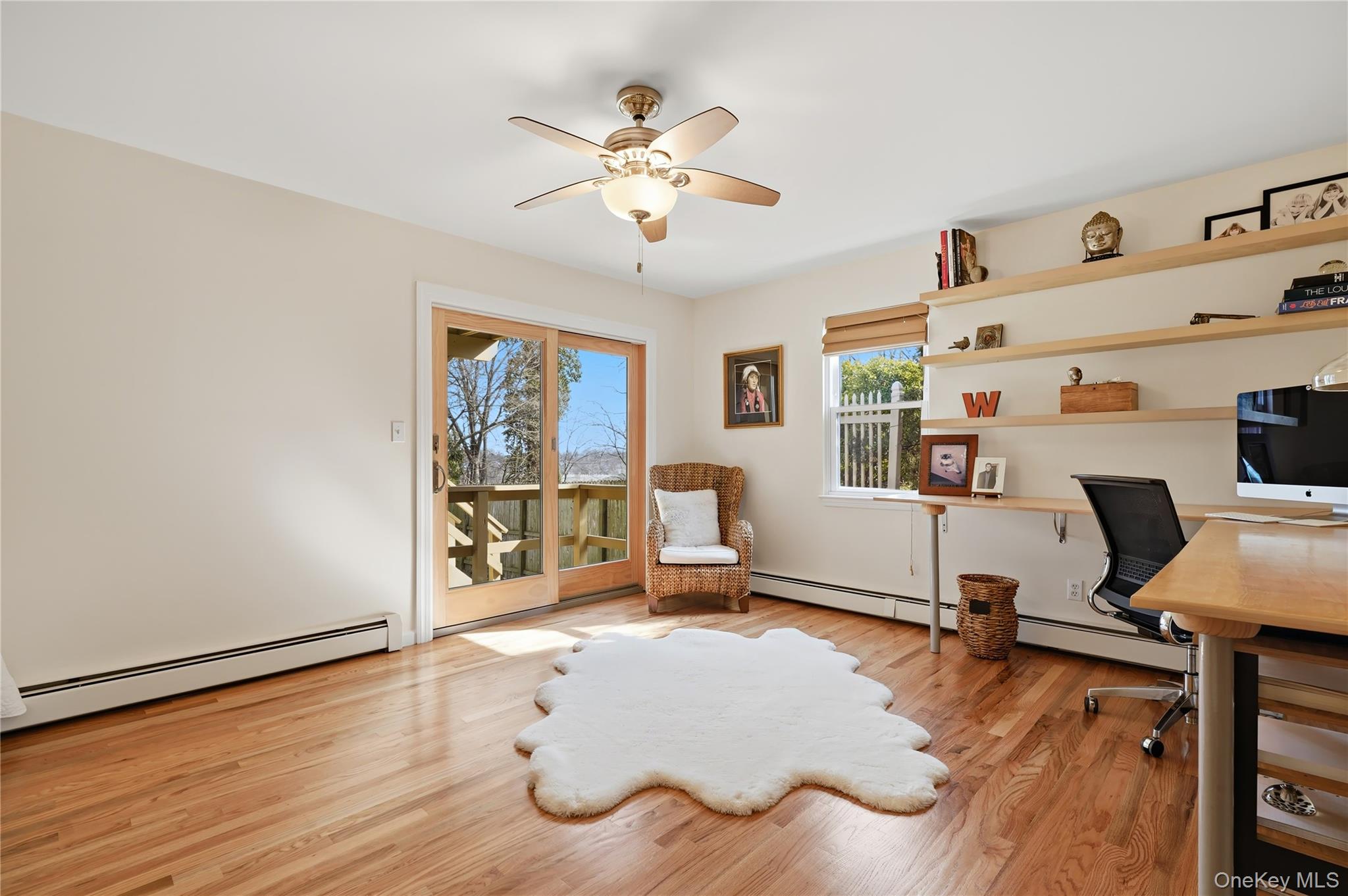 166 Highview Street Mamaroneck, NY 10543 - Photo 20 of 30 a living room with furniture and wooden floor