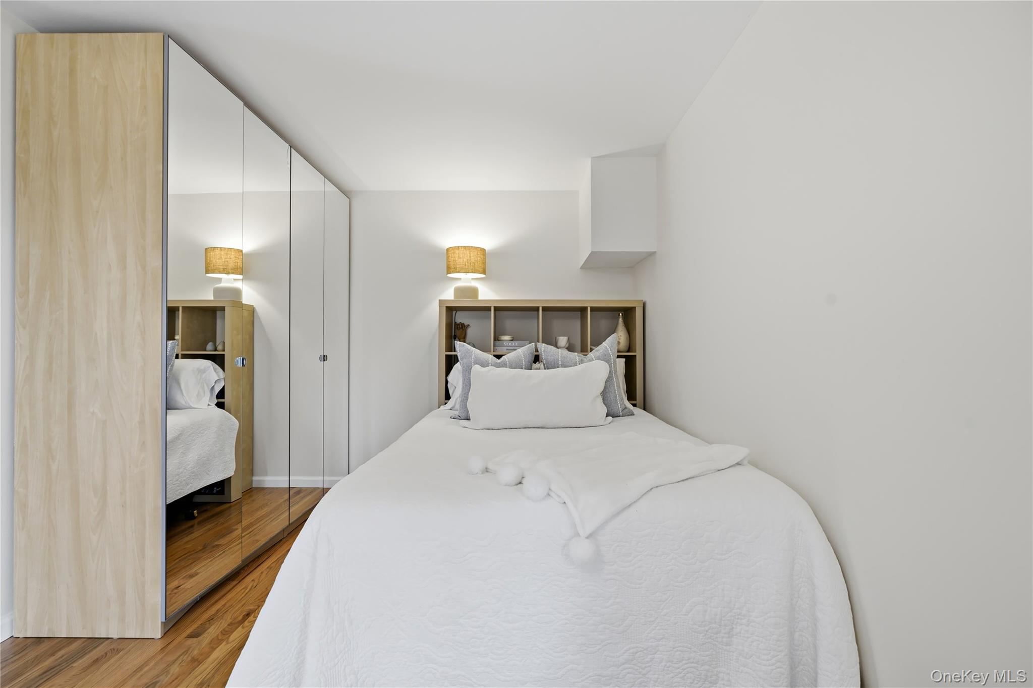 166 Highview Street Mamaroneck, NY 10543 - Photo 21 of 30 a bedroom with a bed and a view of bathroom