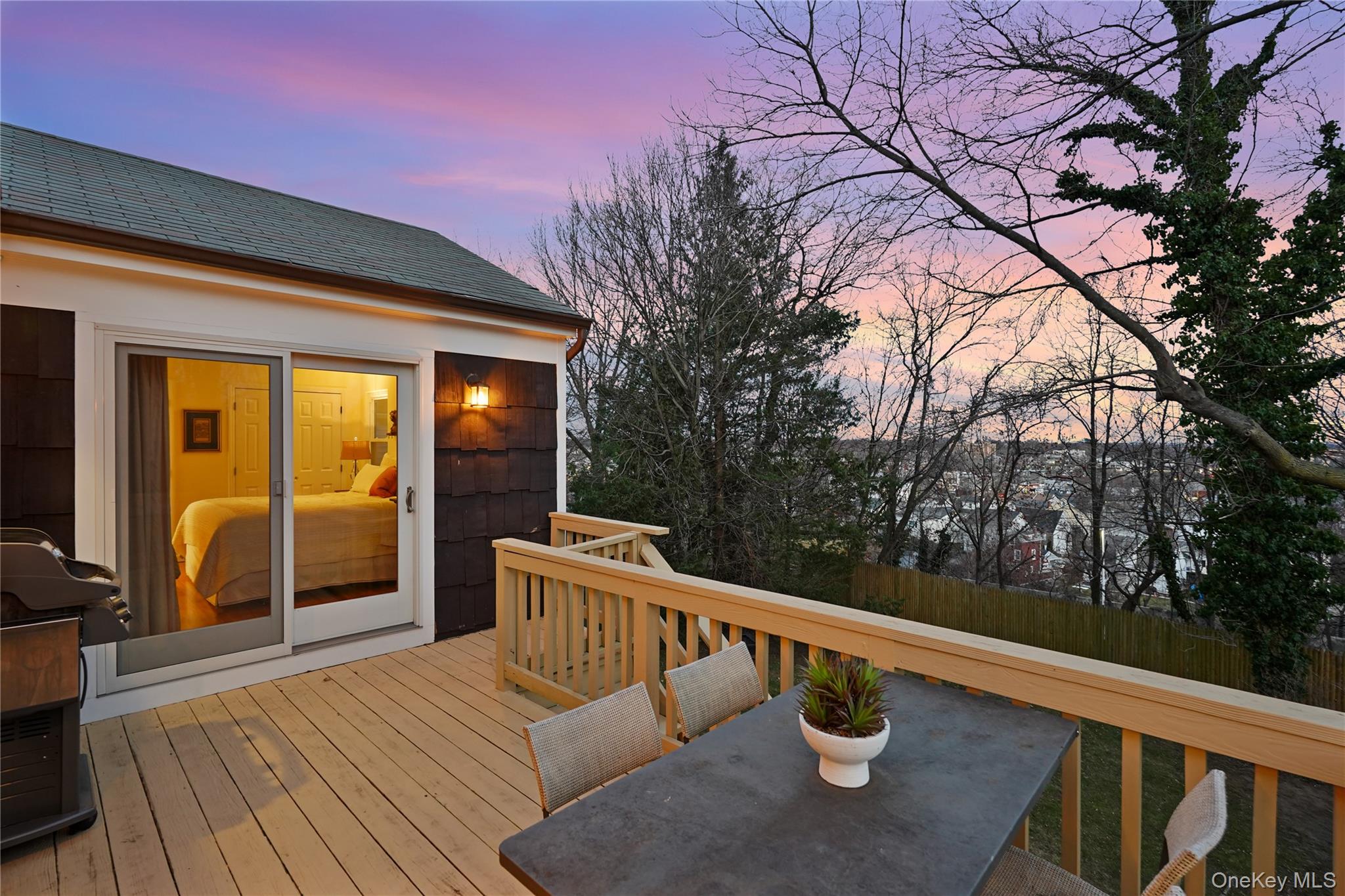 166 Highview Street Mamaroneck, NY 10543 - Photo 26 of 30 a view of balcony with two chairs and wooden floor