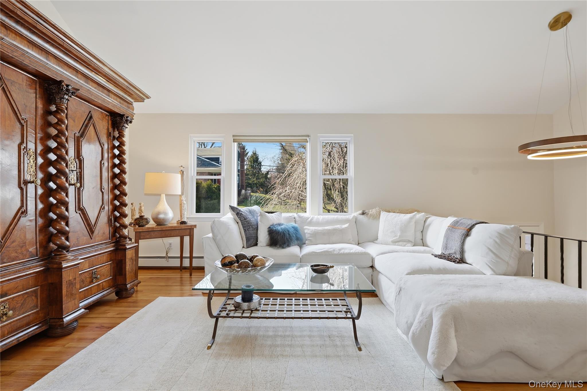 166 Highview Street Mamaroneck, NY 10543 - Photo 5 of 30 a living room with furniture lamp and a large window