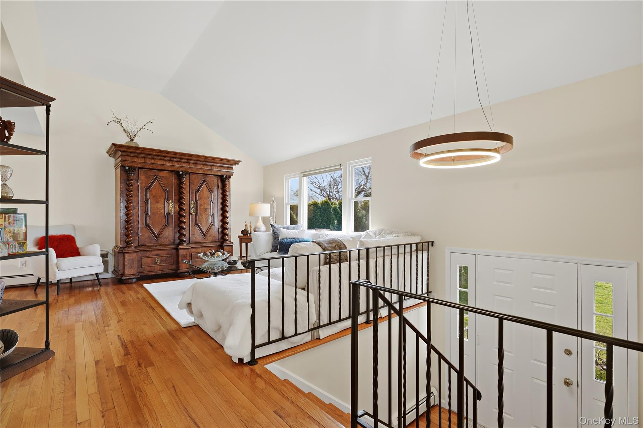166 Highview Street Mamaroneck, NY 10543 - Photo 9 of 30 a view of a livingroom with furniture wooden floor windows and a chandelier
