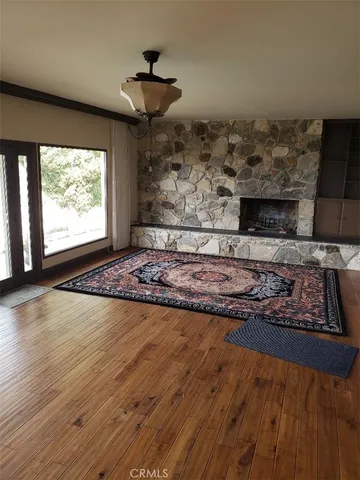 a view of a room window and front door