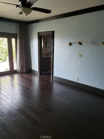 a view of wooden floor in an empty room