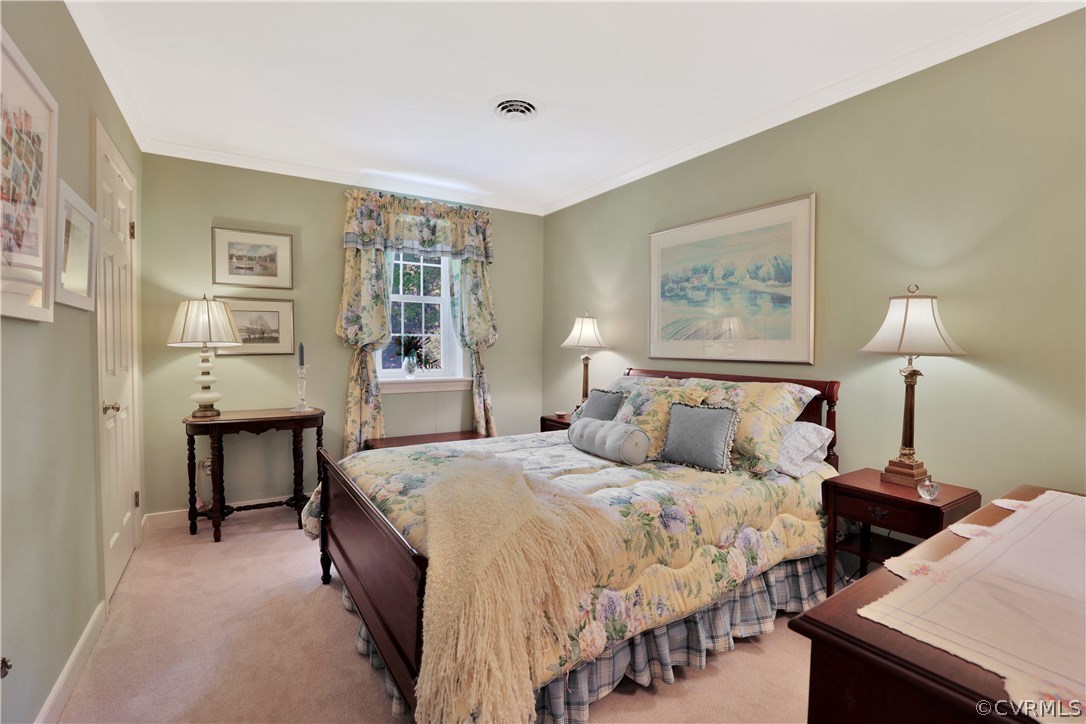 14301 Newgate Road Midlothian, VA 23113 - Photo 25 of 37 a bedroom with a bed and a table