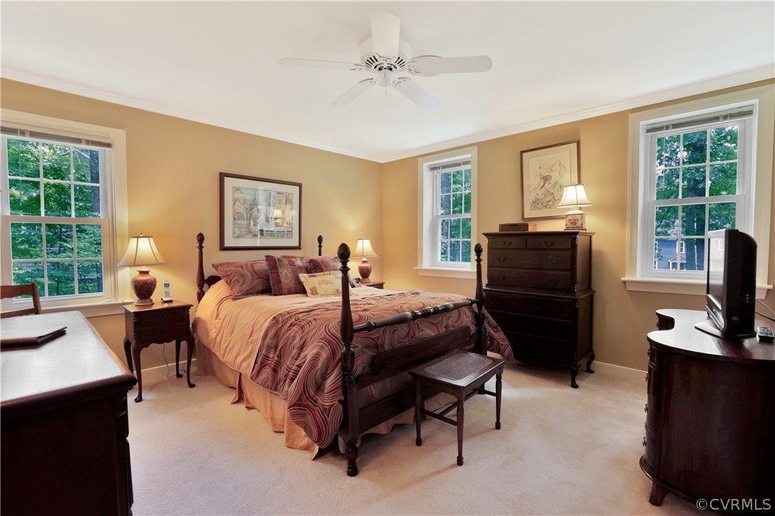 14301 Newgate Road Midlothian, VA 23113 - Photo 27 of 37 a bedroom with a bed dresser and a window