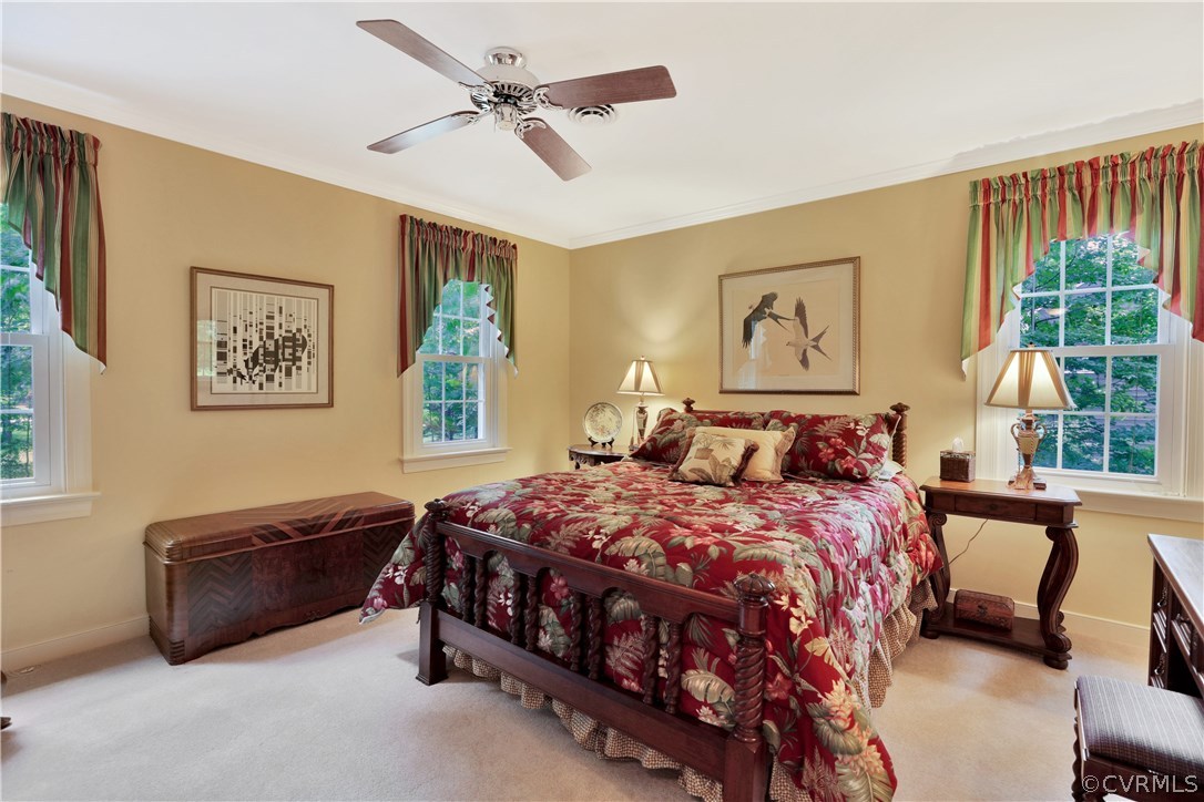 14301 Newgate Road Midlothian, VA 23113 - Photo 28 of 37 a bedroom with a bed a couch and a window