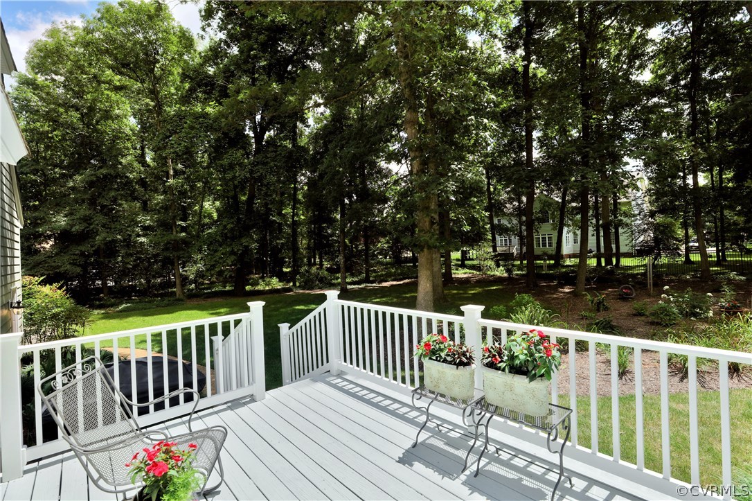 14301 Newgate Road Midlothian, VA 23113 - Photo 31 of 37 a view of a wooden deck and a yard with wooden fence