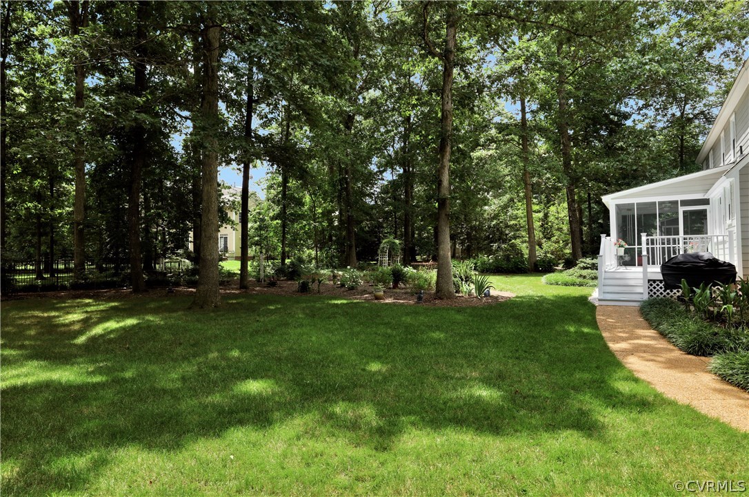 14301 Newgate Road Midlothian, VA 23113 - Photo 36 of 37 a view of a yard with palm trees