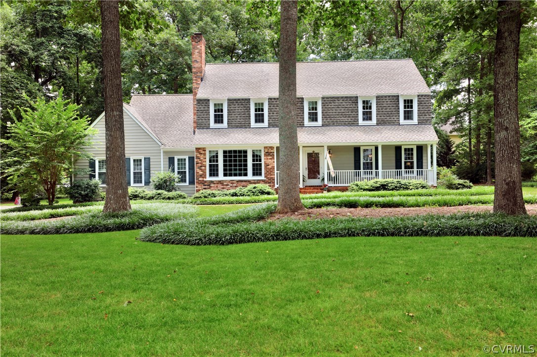 14301 Newgate Road Midlothian, VA 23113 - Photo 37 of 37 a front view of a house with a yard and green space