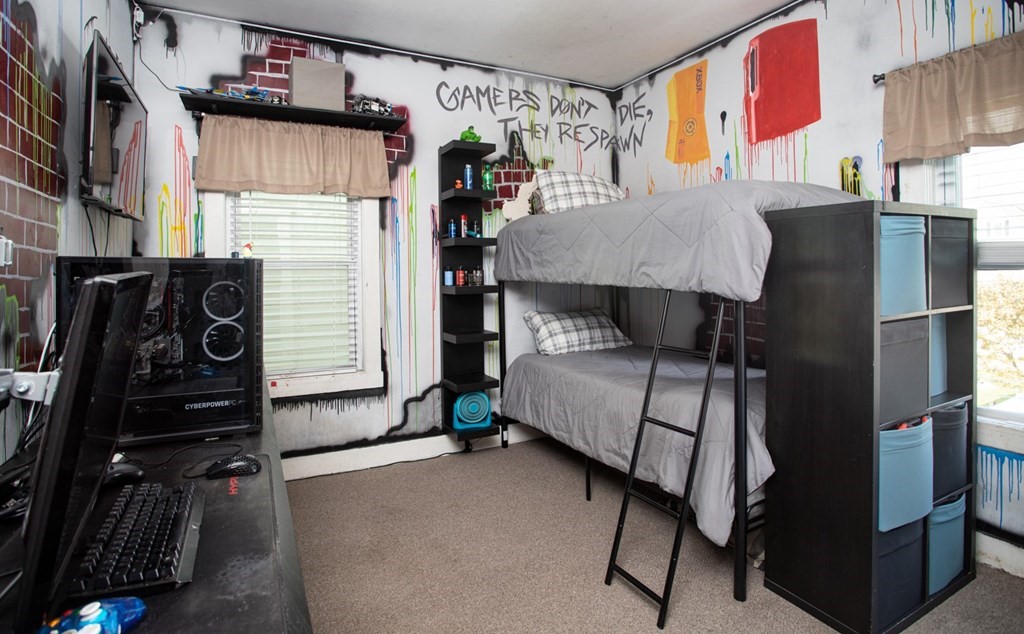 552 Palmer Street Fall River, MA 02721 - Photo 7 of 15 a bedroom with bed and a window
