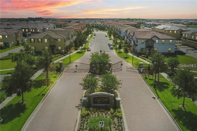 a view of swimming pool and trees in the background