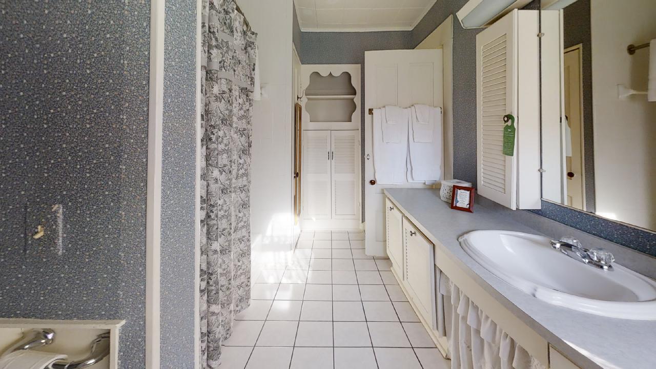 152 Whig Street Dennis, MA 02638 - Photo 17 of 35 a large bathroom with a tub sink and mirror