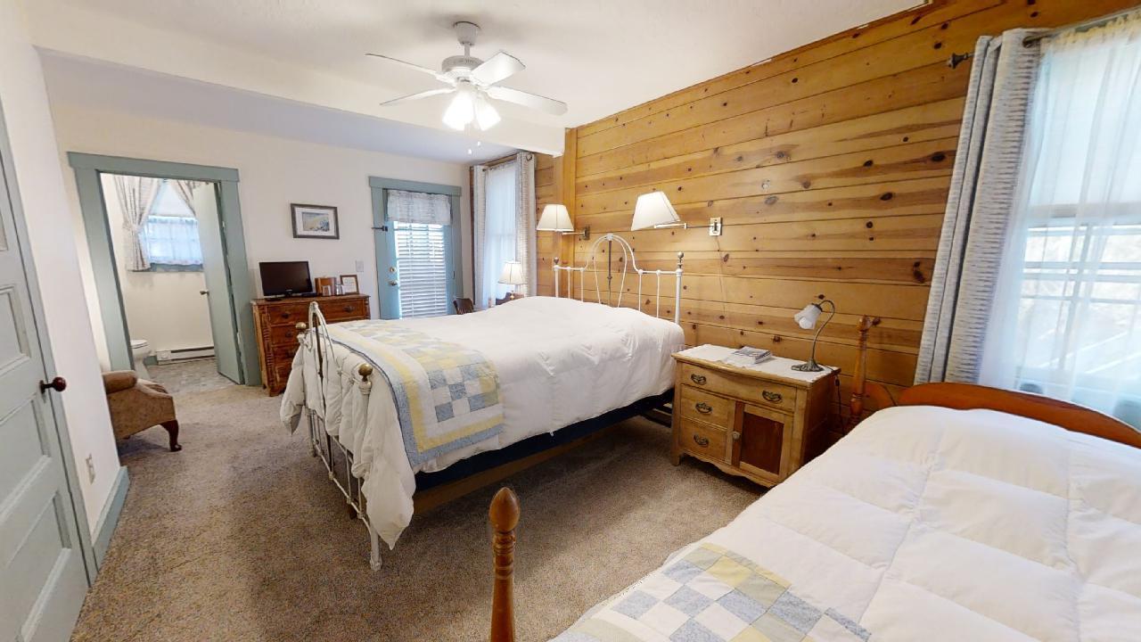 152 Whig Street Dennis, MA 02638 - Photo 20 of 35 a bedroom with a bed couch and window
