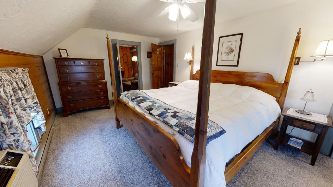 152 Whig Street Dennis, MA 02638 - Photo 22 of 35 a bed room with a bed and a chair