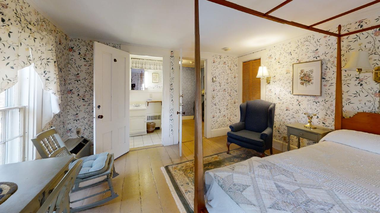 152 Whig Street Dennis, MA 02638 - Photo 24 of 35 a bedroom with a bed couch and a window