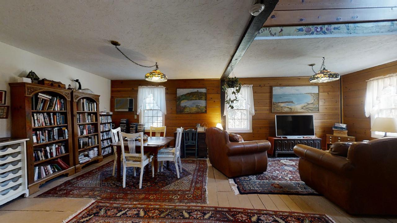 152 Whig Street Dennis, MA 02638 - Photo 26 of 35 a living room with furniture a rug and a window