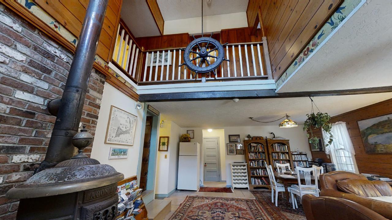 152 Whig Street Dennis, MA 02638 - Photo 28 of 35 a view of a livingroom with furniture and entryway