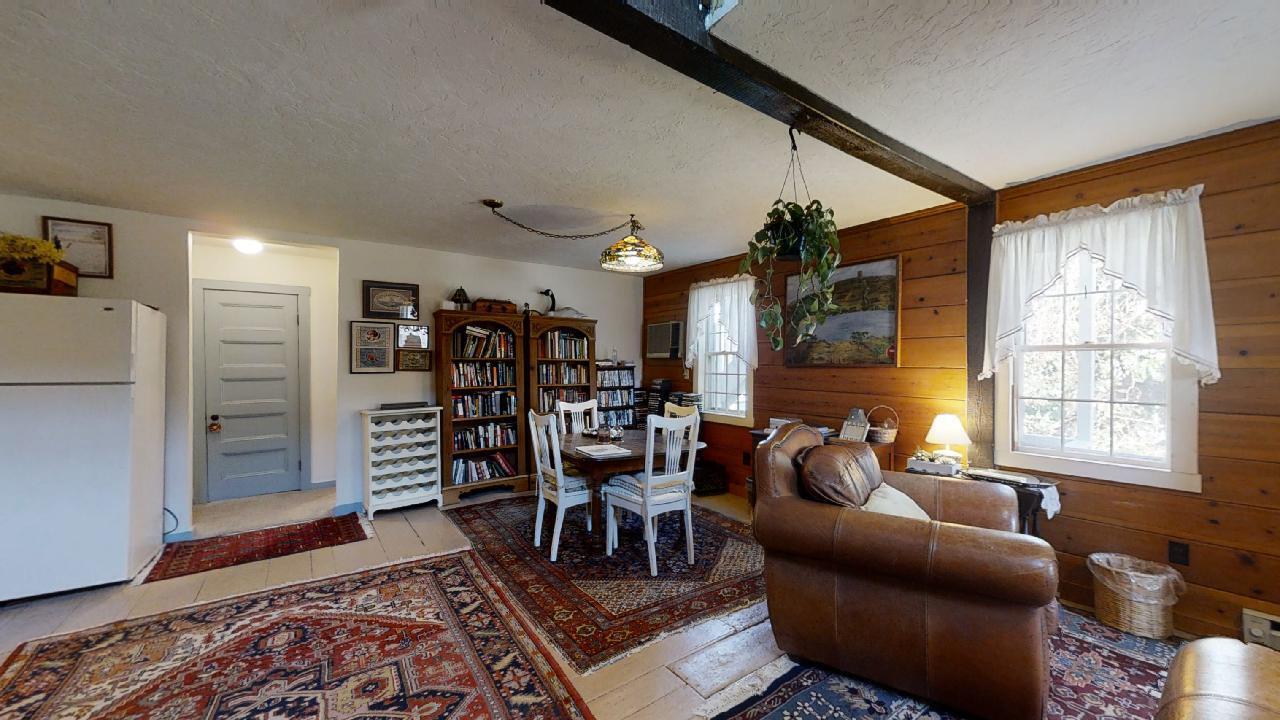 152 Whig Street Dennis, MA 02638 - Photo 29 of 35 a dining room with furniture and wooden floor