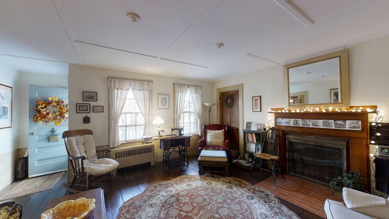 152 Whig Street Dennis, MA 02638 - Photo 3 of 35 a living room with furniture fireplace and window