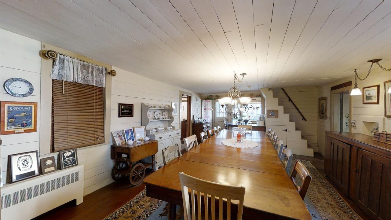 152 Whig Street Dennis, MA 02638 - Photo 6 of 35 a living room with furniture and wooden floor