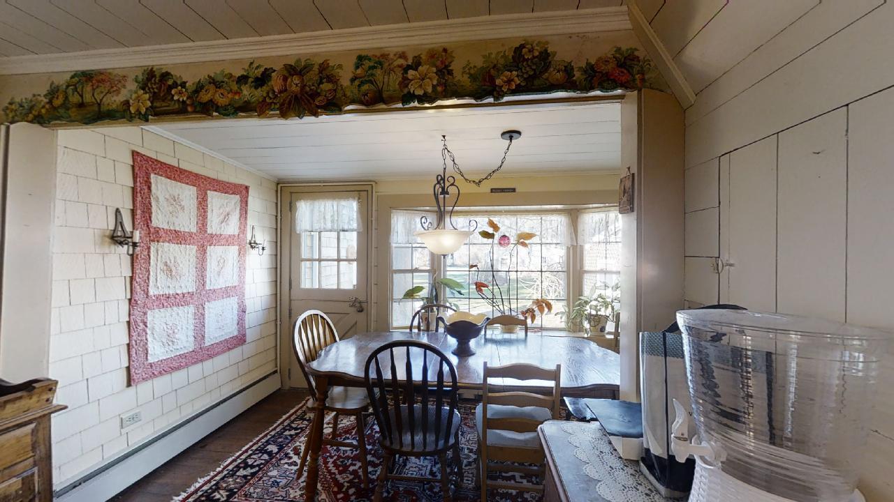 152 Whig Street Dennis, MA 02638 - Photo 7 of 35 a view of a dining room with furniture window and outside view