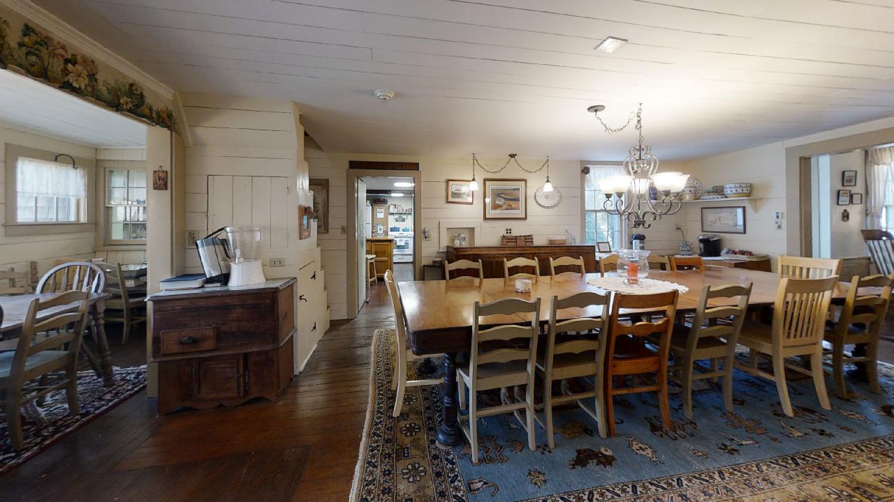 152 Whig Street Dennis, MA 02638 - Photo 8 of 35 a view of a dining room with furniture