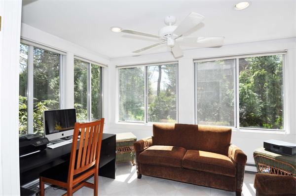 80 Arnold Road Newton, MA 02459 - Photo 6 of 11 a living room with furniture and a floor to ceiling window
