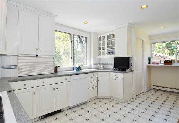 80 Arnold Road Newton, MA 02459 - Photo 8 of 11 a kitchen with a sink and cabinets
