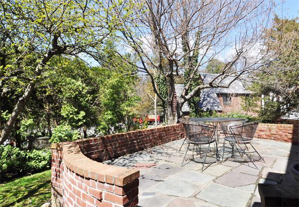 80 Arnold Road Newton, MA 02459 - Photo 10 of 11 a view of a chairs and tables in the back yard of the house