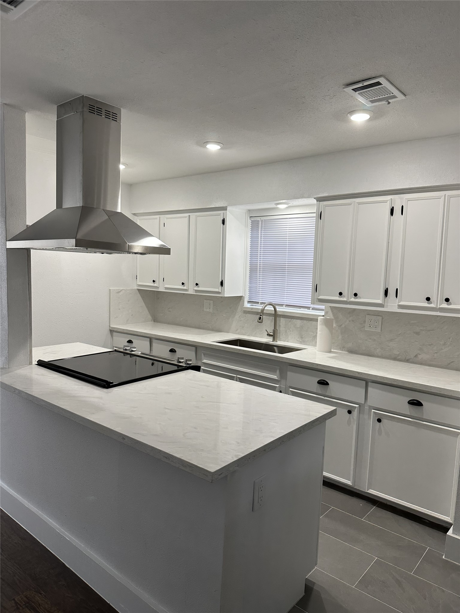804 Ward Street Rosenberg, TX 77471 - Photo 4 of 9 a kitchen with stainless steel appliances a sink and a stove