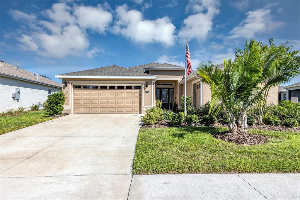 3641 Arlington Ridge Boulevard Leesburg, FL 34748 - Photo 1 of 1 a front view of house with yard