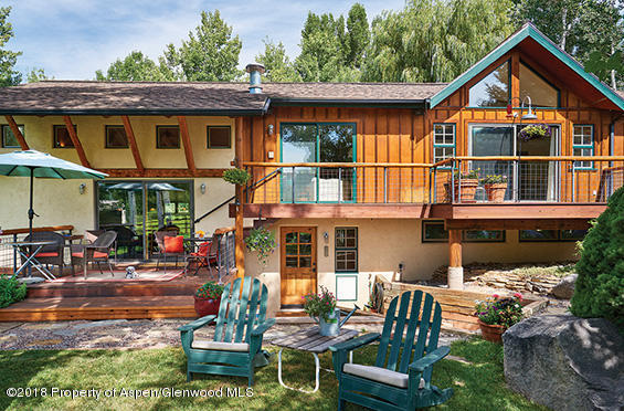 88 Holland Hills Road Basalt, CO 81621 - Photo 15 of 52 a front view of a house with a yard