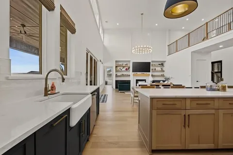 a view of swimming pool with outdoor seating