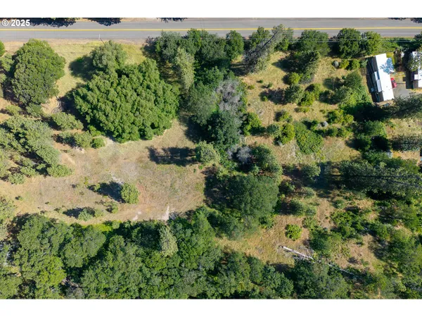 a view of a lake with a building in the background