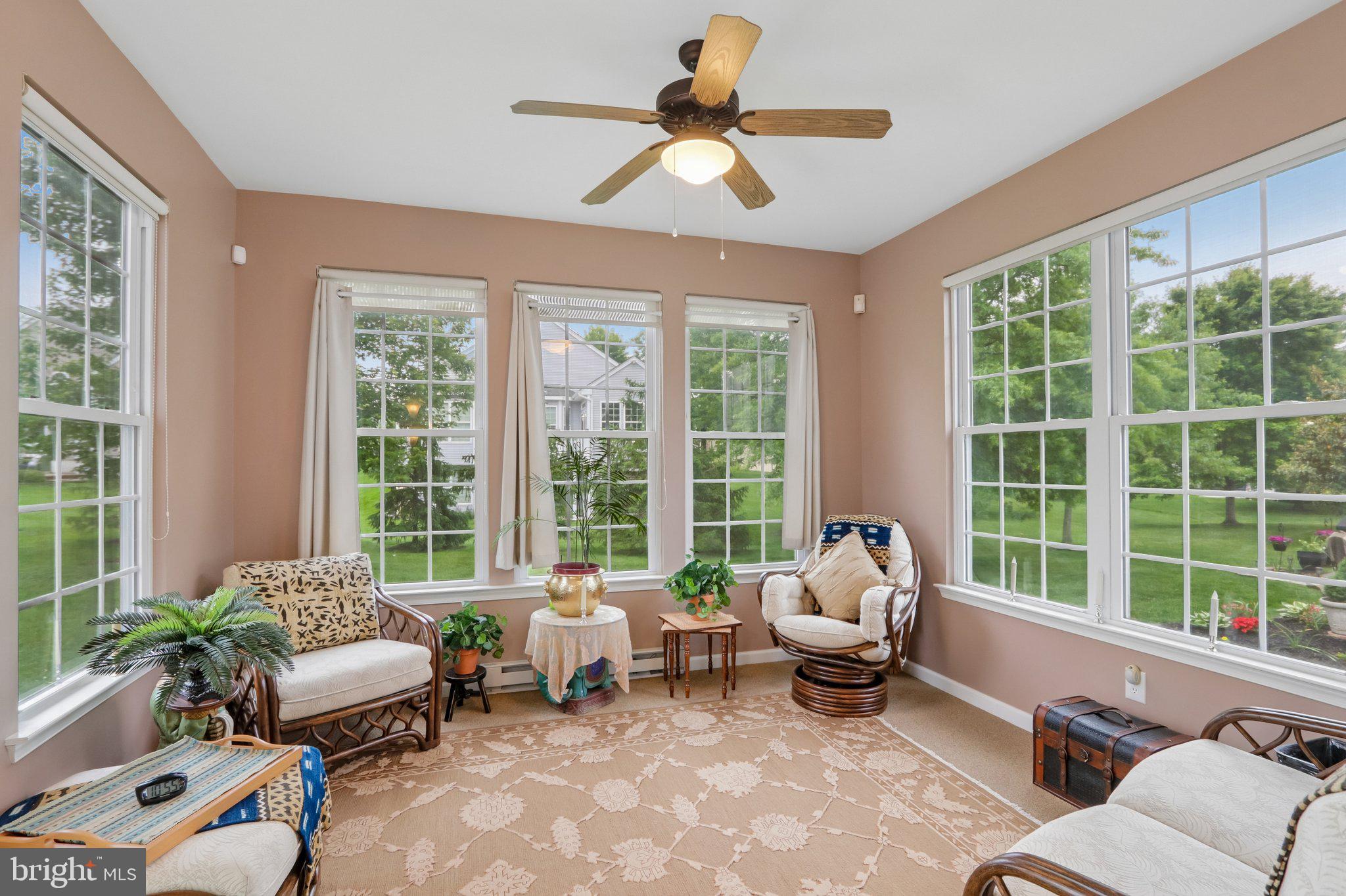 39 Danbury Road Swedesboro, NJ 08085 - Photo 10 of 62 a living room with furniture and floor to ceiling windows