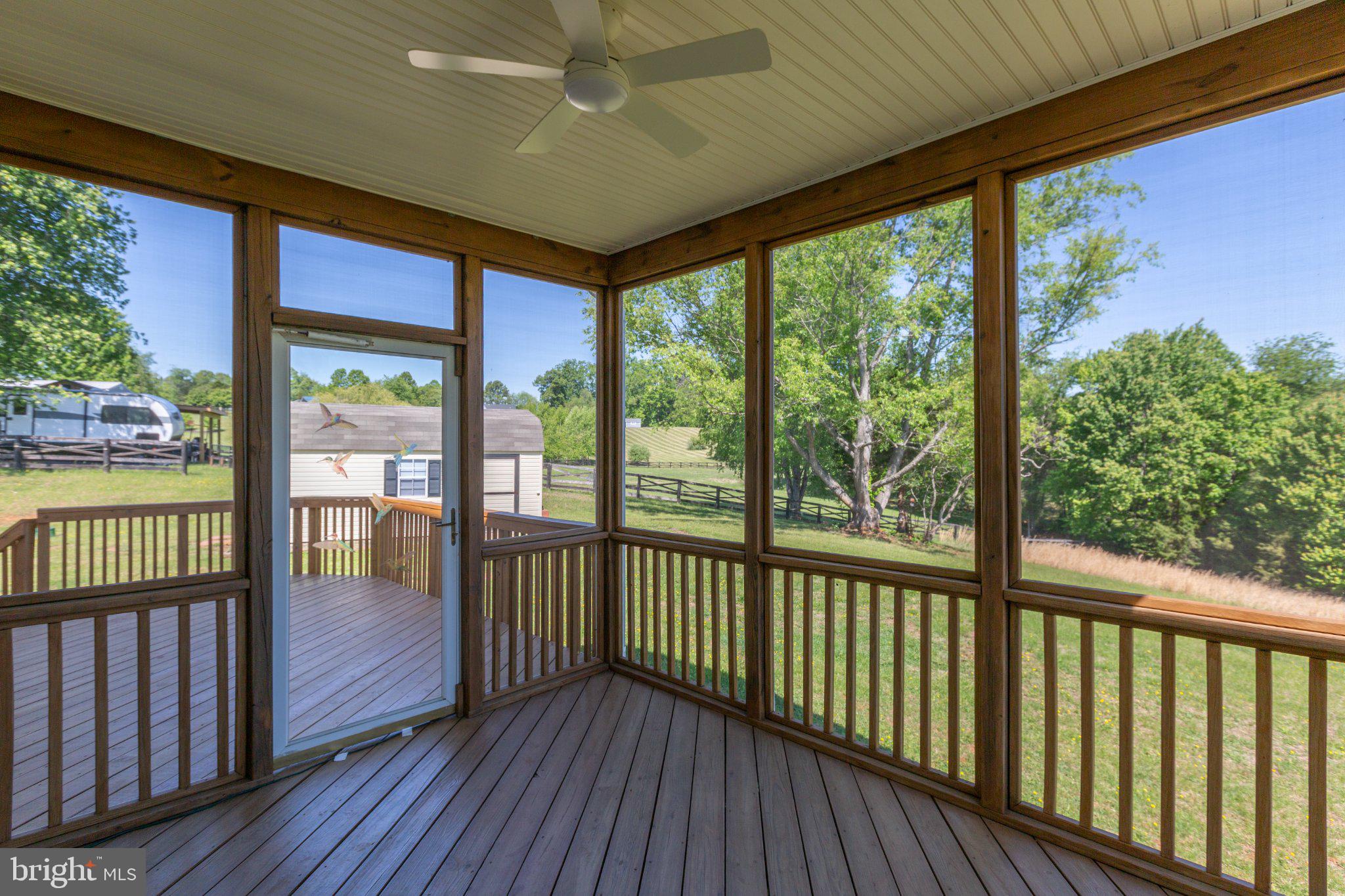16390 Wayland Road Culpeper, VA 22701 - Photo 52 of 92 Serene screened porch with nature views.