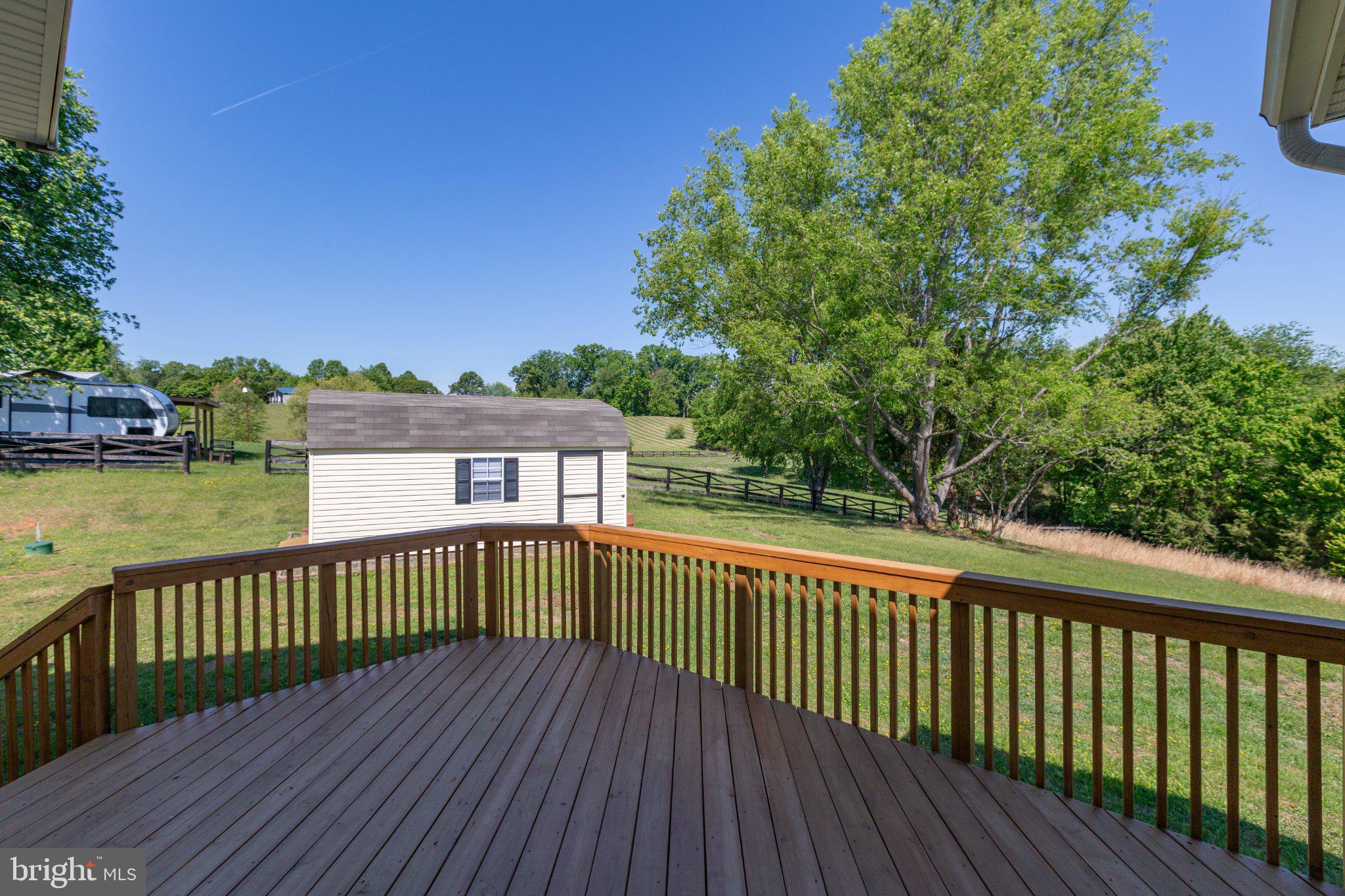 16390 Wayland Road Culpeper, VA 22701 - Photo 64 of 92 Serene deck with lush green views.