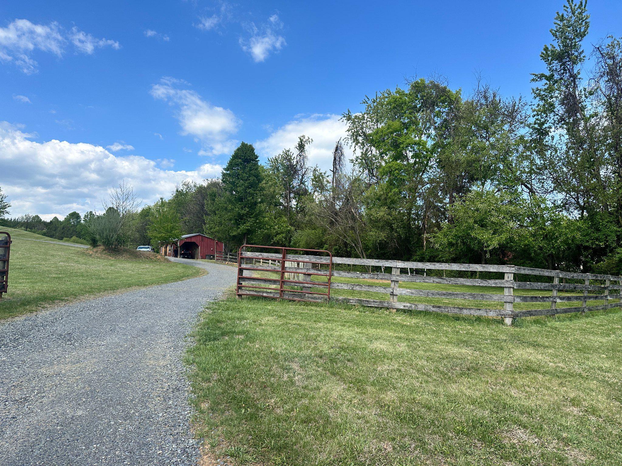 16390 Wayland Road Culpeper, VA 22701 - Photo 7 of 18 Four Board fencing greets you when you arrive