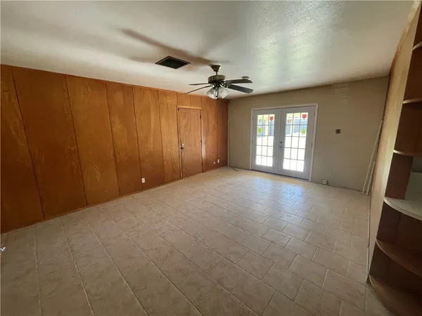 a view of swimming pool with a yard