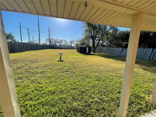 a view of a house with a big yard