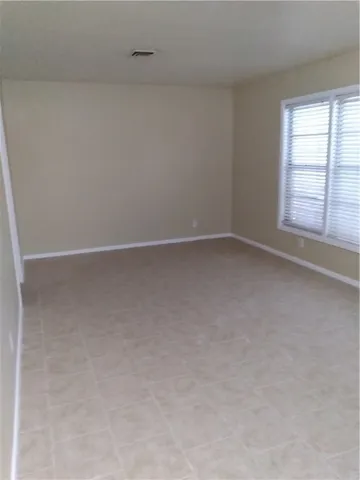 an empty room with a window